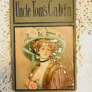 1900 edition of Uncle Tom’s Cabin by Harriet Beecher Stowe — vintage, decorative
