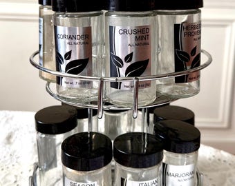 Vintage Kamenstein spinning wire spice rack with 16 labeled glass jars