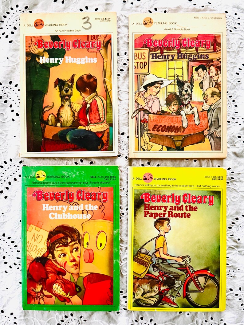 May include: Four vintage Dell Yearling paperback books by Beverly Cleary. Titles include Henry Huggins, Henry and the Clubhouse, and Henry and the Paper Route. Each cover features colorful illustrations of characters, a dog, and various scenes.