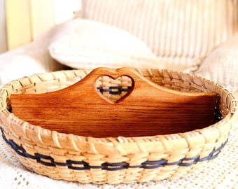 Vintage divided woven basket with wooden heart handle