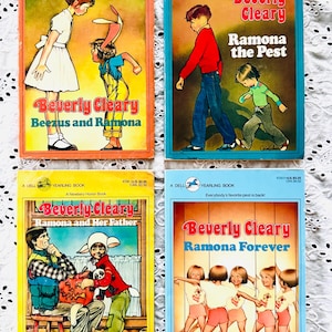 May include: Four vintage Dell Yearling paperback books by Beverly Cleary: Beezus and Ramona, Ramona the Pest, Ramona and Her Father, and Ramona Forever. Each cover features colorful illustrations of children and text titles in a rectangular format.