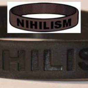 May include: Black rubber bracelet with the word "NIHILISM" embossed in white letters.