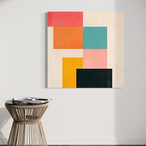 Puede incluir: Impresi&oacute;n de arte geom&eacute;trico abstracto con fondo blanco y cuadrados coloridos en tonos de rosa, naranja, amarillo, turquesa y negro.