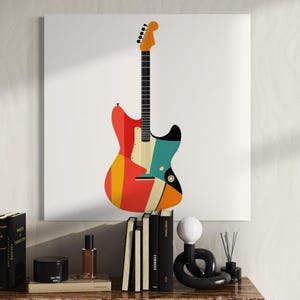 Może przedstawiać: Kolorowy, abstrakcyjny nadruk gitary na białym pł&oacute;tnie. Gitara ma czerwony, pomarańczowy, ż&oacute;łty i turkusowy design. Szyjka gitary jest czarna z białymi progami, a gł&oacute;wka pomarańczowa.