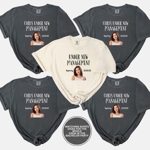 a group of t - shirts with a woman's face on them