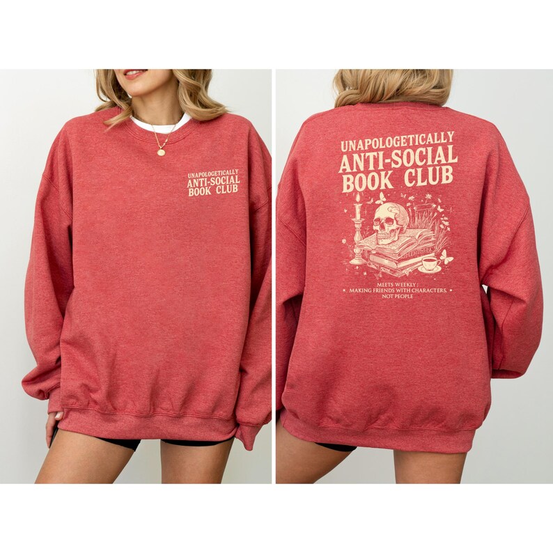A red sweatshirt with text and graphics on the back.