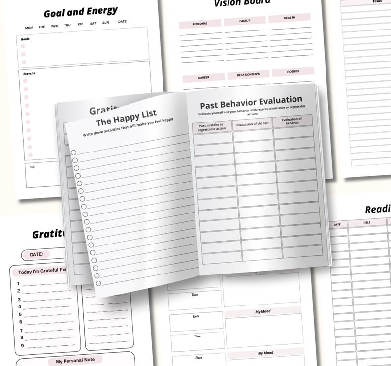 May include: Open planner with various pages for goal setting, gratitude, and self-reflection. The pages include sections for daily goals, exercise, and a "Happy List" to write down activities. The planner has a clean, minimalist design.