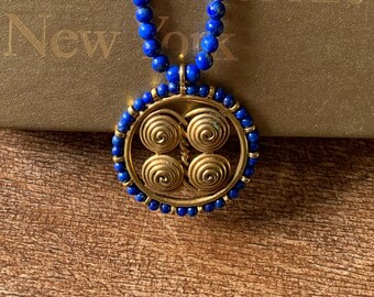 Rare Lapis Lazuli and Gold Necklace choker in perfect condition from the Metropolitan Museum of Art store's Spiral jewelry Vintage MMA