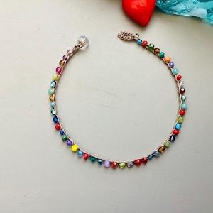 Sunkissed crocheted anklets with gemstones, beachy