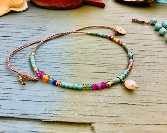 Crocheted turquoise Gemstone necklace with pearl drop