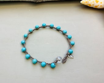 Turquoise crocheted earthy bracelet with silver leaf