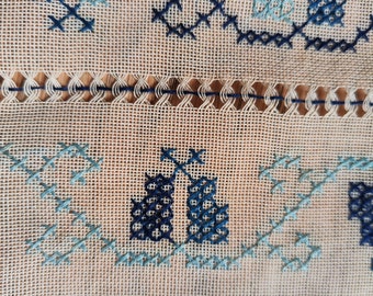 Set of 5 blue embroideries, doilies and bib