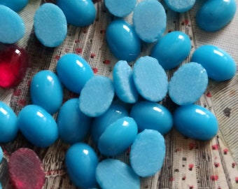 Antique tiny oval turquoise or red cabochons