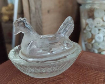 Glass hen sitting on his basket -  French glass hen