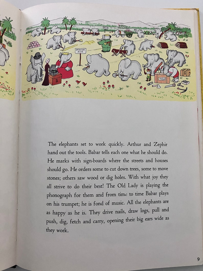 May include: An illustration from a children's book showing a group of elephants working on a construction project. The elephants are using tools and materials to build a town. The text in the image reads "GRANDE AVE" and "TOOLS".