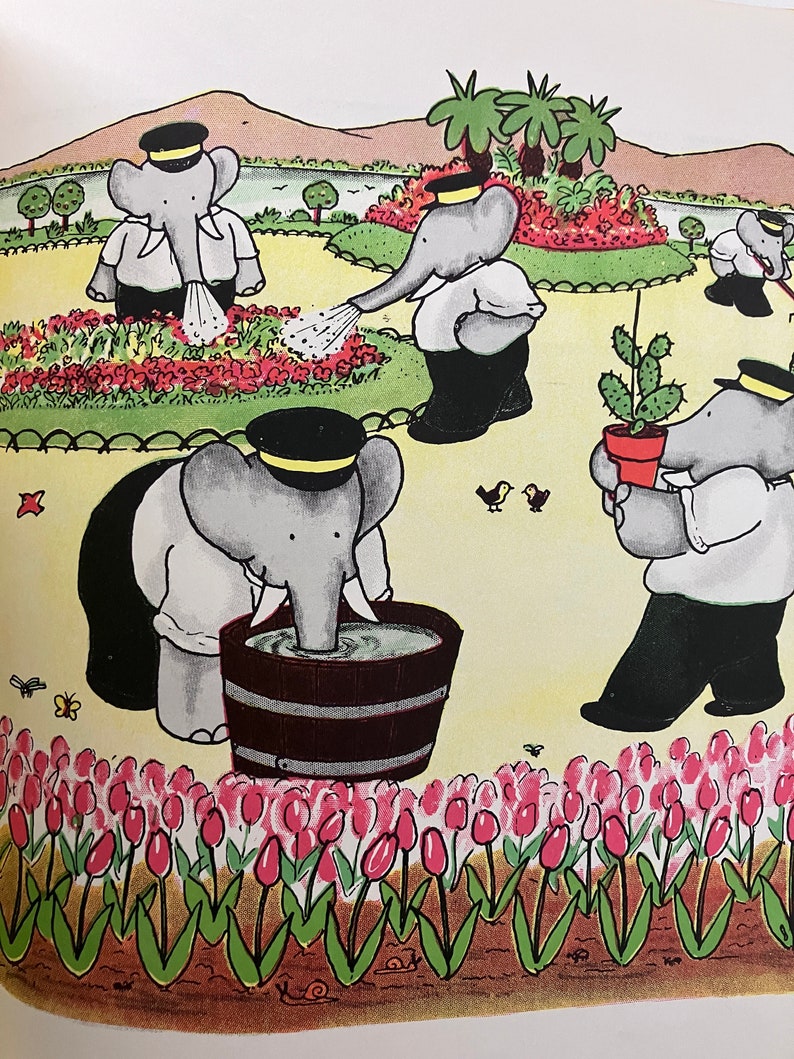 May include: Four elephants wearing hats and carrying gardening tools are working in a garden. One elephant is watering flowers, another is watering a cactus, another is filling a bucket with water, and the last elephant is standing in a bed of pink tulips.