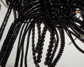 Tibetan Lignite Jet beads 15-16" strands