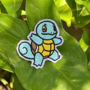 Squirtle-borduurpatch 2" aannaaien, strijken. polyesterdraad en witte viltstof. Pokemon, anime, tekenfilms, personages, pikachu