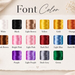 May include: A colour chart titled Font Color displaying eighteen individual spools of embroidery thread in various shades including white, black, light brown, yellow, gold, orange, dark brown, bright pink, light pink, dark red, light blue, dark blue, purple, light purple, dark grey, and green.