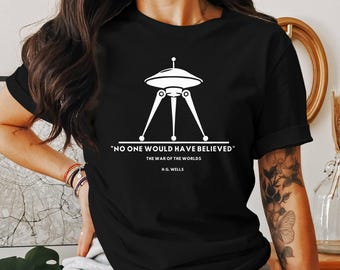 May include: Black t-shirt with a white graphic of a retro flying saucer and the quote "NO ONE WOULD HAVE BELIEVED" from H.G. Wells' "The War of the Worlds." A simple, bold design, ideal for science fiction enthusiasts.