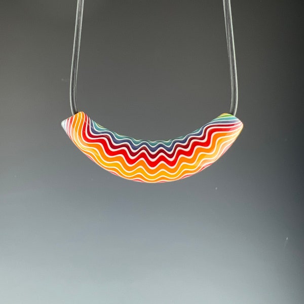 Rainbow WigWag Curve - Flameworked borosilicate glass pendant by Beau Barrett