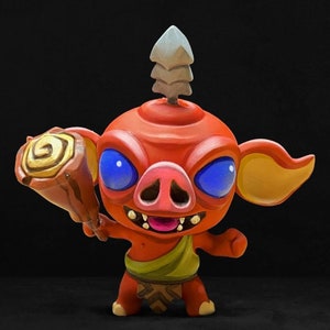May include: A hand-painted figurine of a red, pig-like creature with a pointed, gray headpiece. The creature has blue eyes, a large pink snout, and a toothy grin. It is holding a brown club with a gold spiral design.
