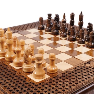 May include: A wooden chess set with light and dark pieces arranged on a checkered board. The board is set within a decorative, dark brown frame with a lattice design. The chess pieces are in place, ready for a game.