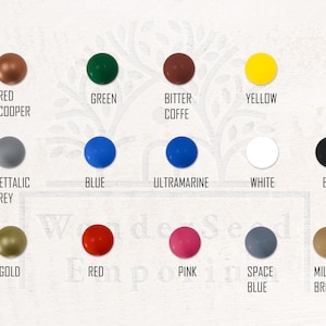 May include: A color chart featuring twelve round, solid-colored objects with corresponding text labels. Colors include red copper, green, bitter coffee, yellow, metallic grey, blue, ultramarine, white, black, gold, red, pink, space blue, and milky brown.