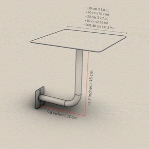 May include: A wall-mounted shelf with a square top, supported by a curved metal arm. The shelf is 31.5 inches (80 cm) wide. The arm extends 17.7 inches (45 cm) from the wall and is 9.8 inches (25 cm) long.