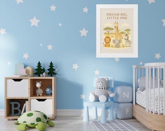 May include: A framed nursery art print with the text "Dream Big, Little One" and illustrations of a giraffe, lion, elephant, and zebra. The print is displayed in a child's room with a blue wall and star decals.