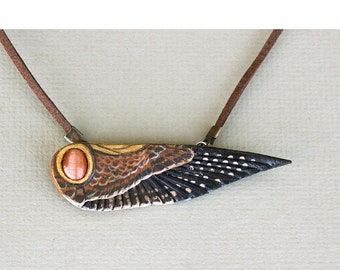 Female American Kestrel Wing Leather Necklace - Bird Wing Raptor Jewelry with Cats Eye Cabochon - 3 inches