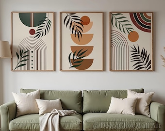 Puede incluir: Tres impresiones artísticas abstractas enmarcadas con formas geométricas, arcos y elementos botánicos en tonos tierra. Las impresiones se exhiben sobre un sofá verde con cojines color crema. El arte presenta tonos de marrón, verde y crema.
