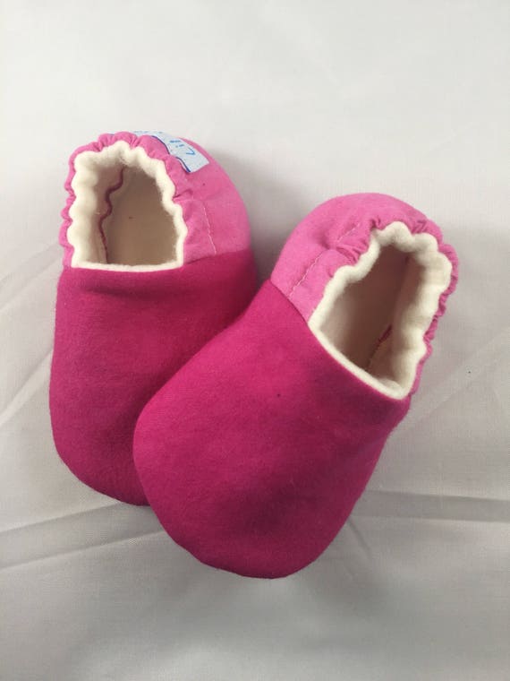 pink baby slippers