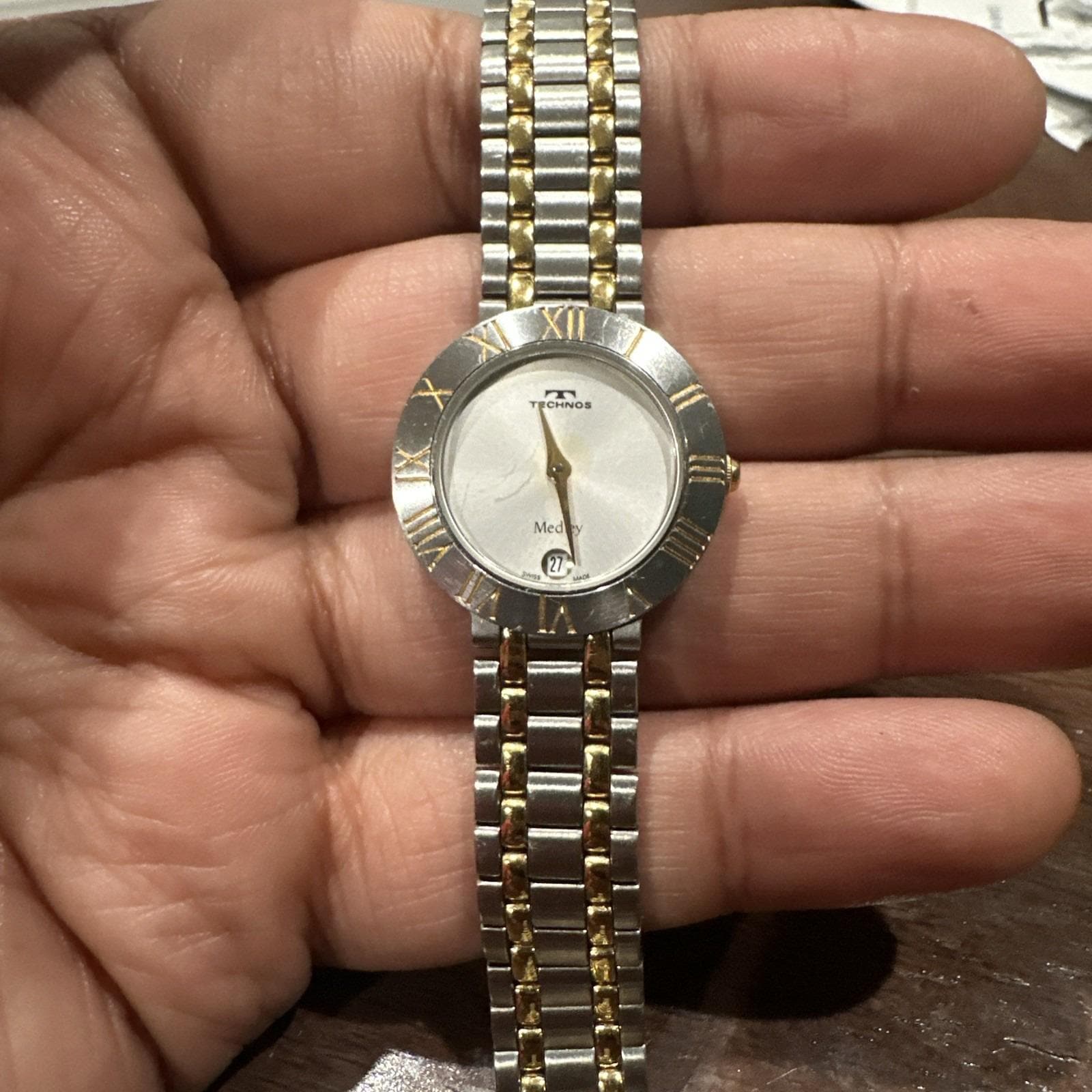 Two-tone Technos Women's Watch With Roman Numerals and Date