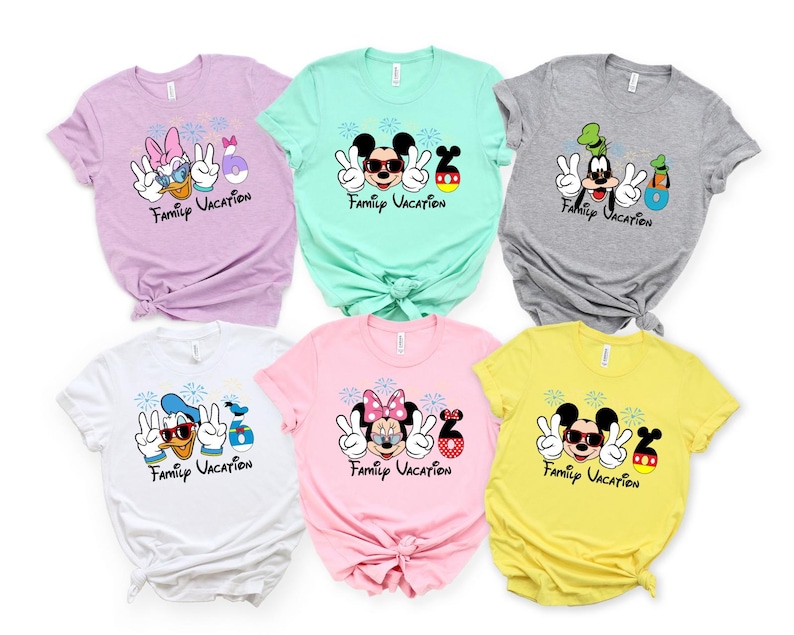 a collection of six t-shirts, each featuring a different Disney character and the text "Family Vacation" printed on them.