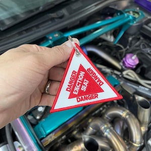 Ejection Seat Triangle Jet Tag Red