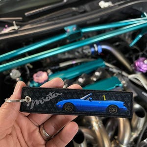 Mazda NA Miata Blue Jet Tag keytag grey