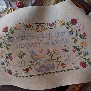 Springtime blossom Sampler - Counted Primitive Cross stitch pattern PDF by Stitches Through The Years
