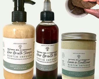 May include: An assortment of hair care products, including shampoo, oil, and leave-in conditioner, with the text "Batana Oil & Rosemary Hair Growth" and "Biotin Infused." The products are in clear and amber-colored bottles and a jar.