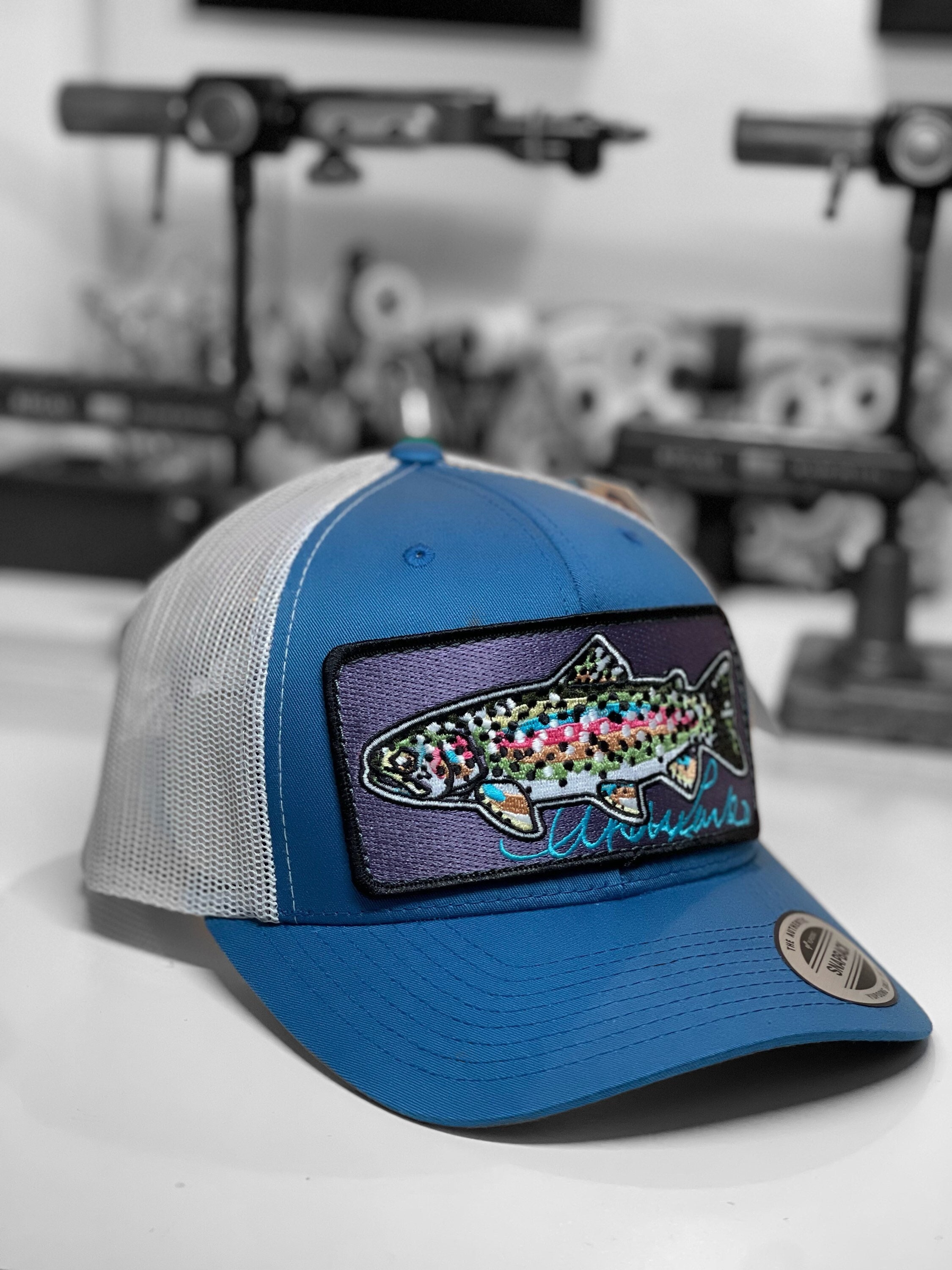 Embroidered Rainbow Trout Patch Steel Blue Trucker Hat 