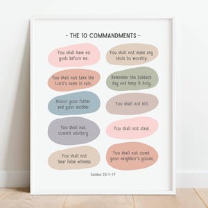 May include: A printable poster with the Ten Commandments written in a modern, minimalist style. The text is written in a light gray font on a series of colorful, rounded rectangles. The poster includes the text "Exodus 20:1-17" at the bottom.