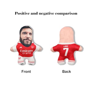 May include: Two plush dolls, one showing the front and back of a soccer player. The front doll has a photo of a man's face and wears a red and white jersey with the Emirates logo. The back doll has a red jersey with the name "LUKE" and the number "7". The text "Positive and negative comparison" is above the dolls.
