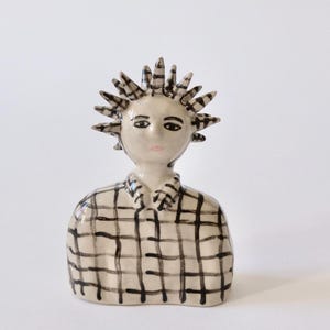 Handmade Ceramic Boy Sculpture: Striped Shirt, Spiked Cap Art