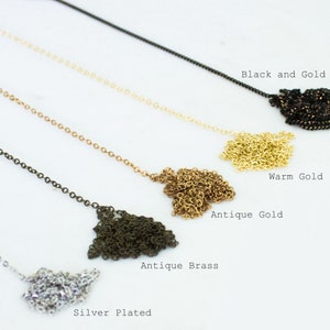 5 different chain options, silver plated, antique brass, antique gold, warm gold and black and gold