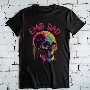 May include: Black t-shirt with a colorful skull graphic and the text "EMO DAD" in pink and black letters.