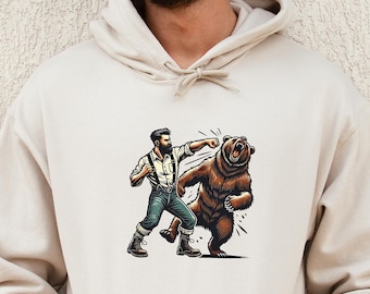 Funny Man vs Bear Unisex Hoodie - Hiking Adventure Sweatshirt, Animal Lover Hoody, Wilderness Bear Fighting Jumper, Outdoor Wildlife Graphic