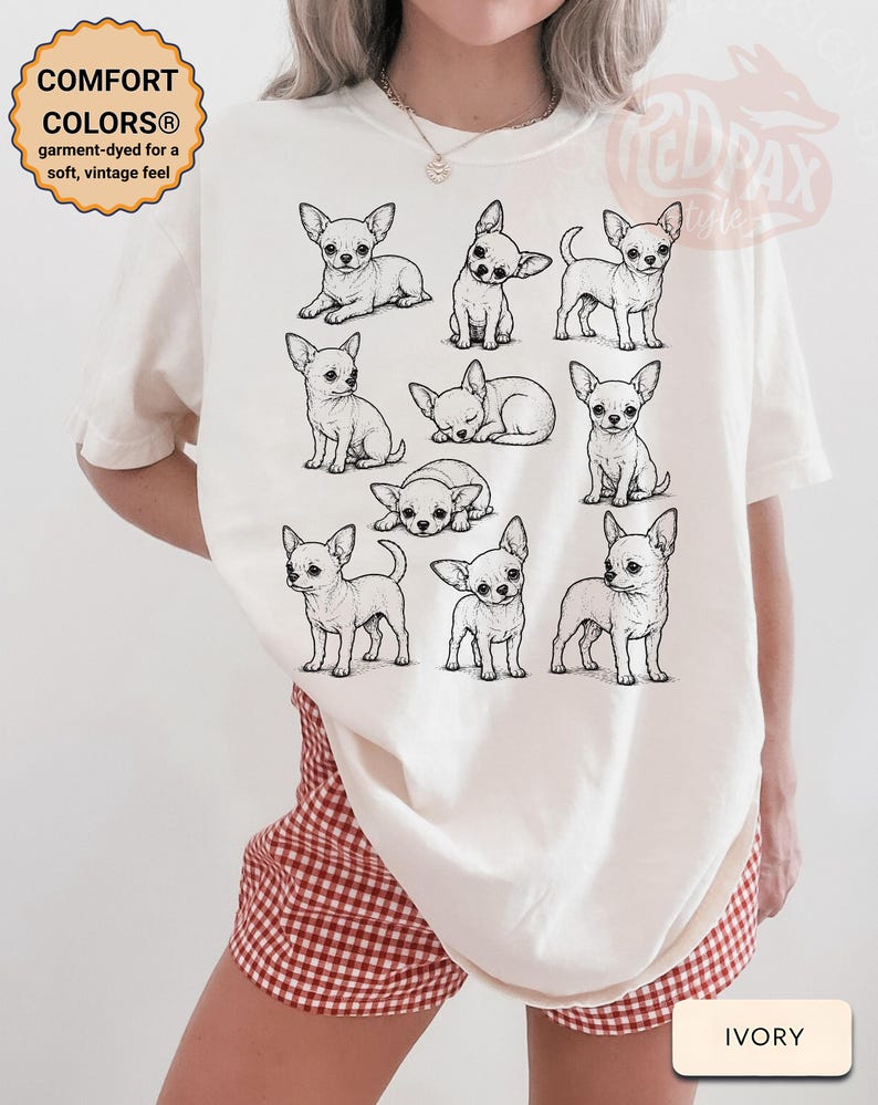 May include: An ivory t-shirt featuring a black line art graphic of ten different Chihuahua dogs in various poses. The shirt includes a circular badge in the top left corner with the text COMFORT COLORS garment-dyed for a soft, vintage feel.