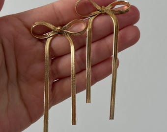 Gold Bow Drop Earrings: Elegant Long Ribbon Studs