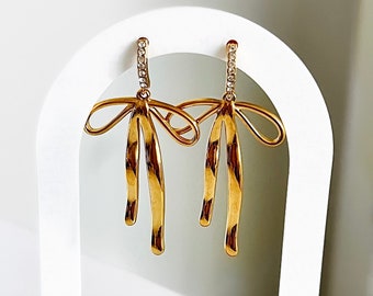14K Gold Bow Dangle Earrings: Trendy Ribbon Jewelry