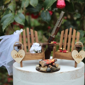 Hunting-Adirondack Chairs-Wedding-Shotgun-Shotgun Shells-Sportmans-Guns-Campfire-Bride-Groom-Rustic-Nature-Outdoor-The Hunt is Over